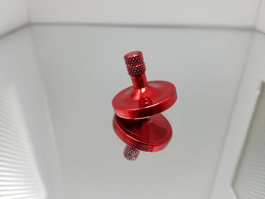 Shown here a KD Starter Precision Spinning Top in Candy Red Aluminum