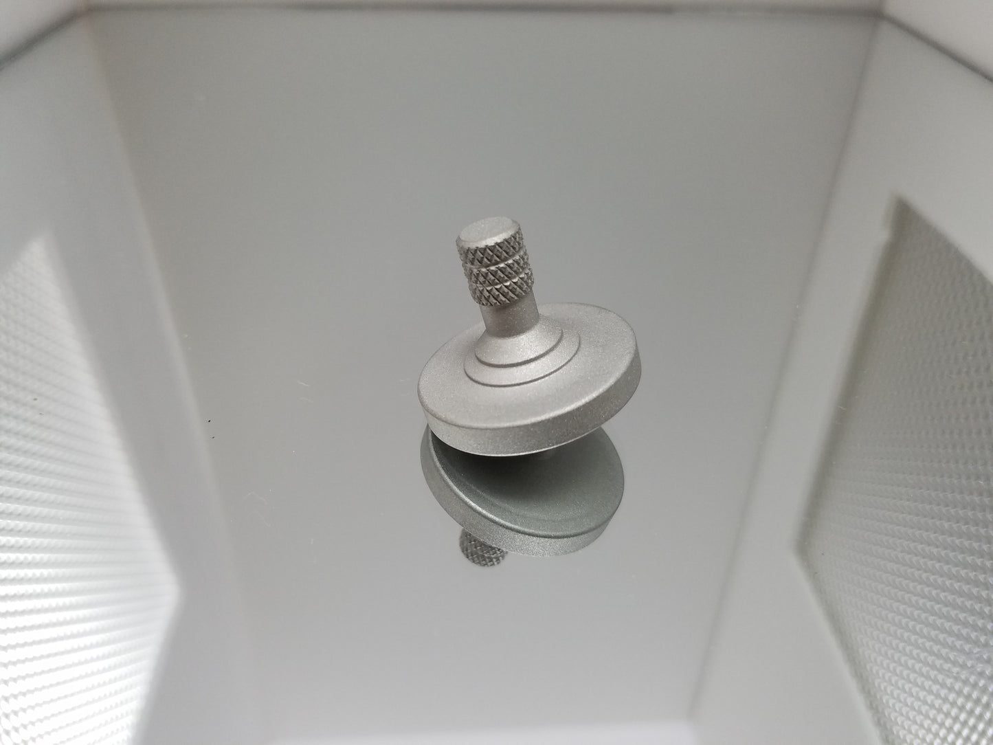 Stainless Steel Spinning Top with a Blasted Finish - Kemner Design