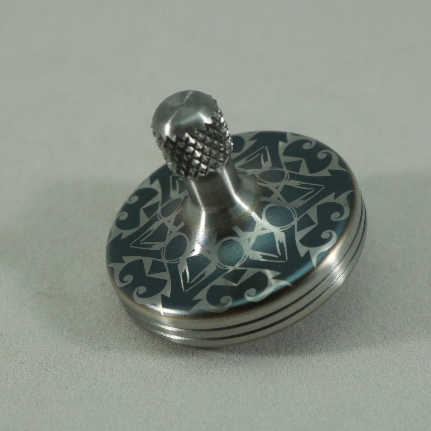 S2- Laser Etched Inverted Snowflake on a Stainless Steel Spinning Top Version 3