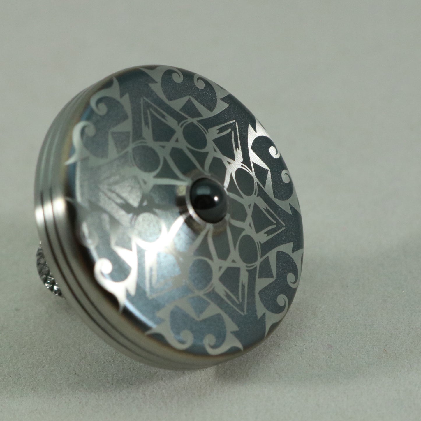 S2- Laser Etched Inverted Snowflake on a Stainless Steel Spinning Top Version 3