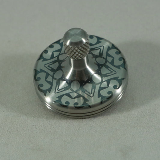 S2- Laser Etched Snowflake on a Stainless Steel Spinning Top v3