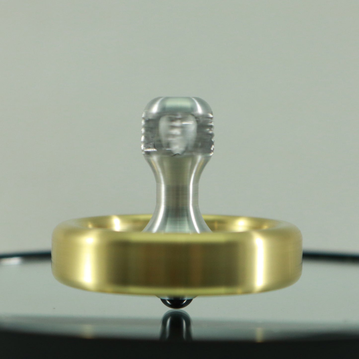 Dynamo - Brass and Aluminum Spinning Top w/ Super Grip Spindle