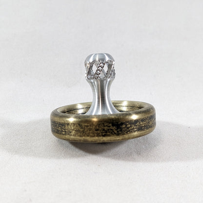 Dynamo - Antique Brass and Aluminum  Spinning Top w/ Super Grip Stem (Ceramic)
