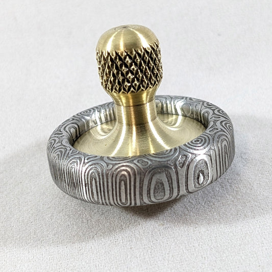 Dynamini - Damasteel and Brass