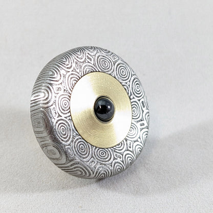 Dynamini - Damasteel and Brass