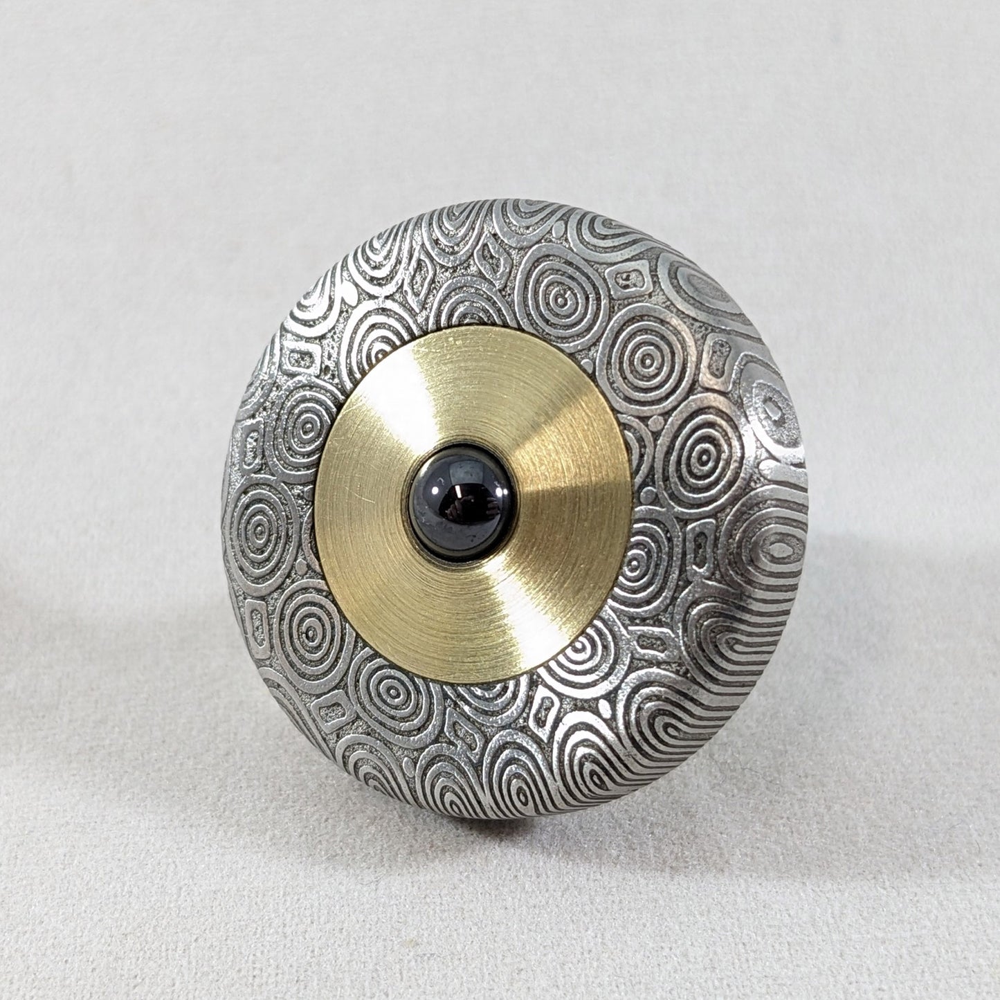 Dynamini - Damasteel and Brass