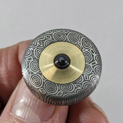 Dynamini - Damasteel and Brass