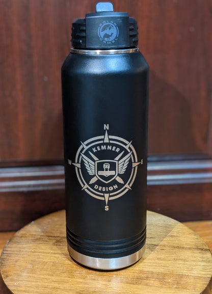 32 oz black Polar Camel water bottle with laser engraved Kemner Design compass logo featuring wings and cardinal directions