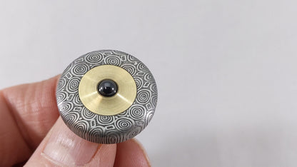 Dynamini - Damasteel and Brass