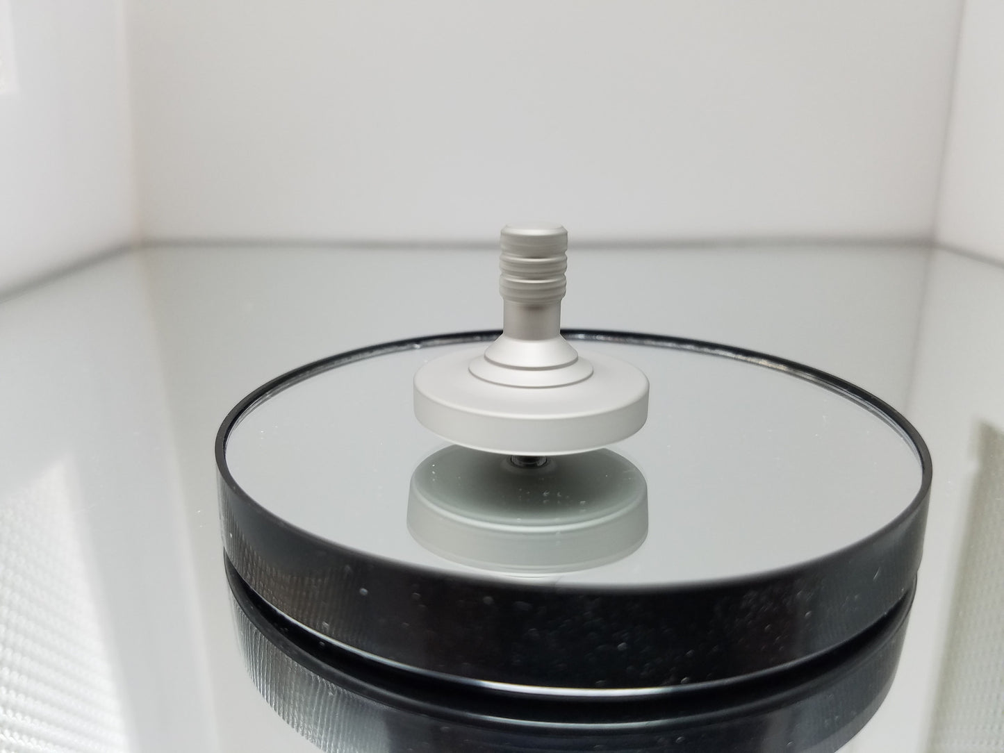 Stainless Steel Spinning Top with a Blasted Finish - Kemner Design