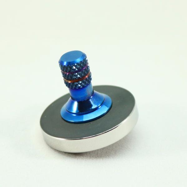 Blacked out and polished stainless steel with a heat anodized titanium spindle #1 - Kemner Design