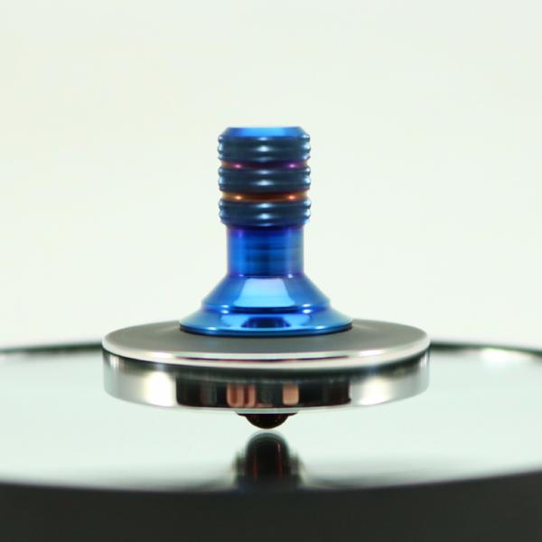 Blacked out and polished stainless steel with a heat anodized titanium spindle #1 - Kemner Design