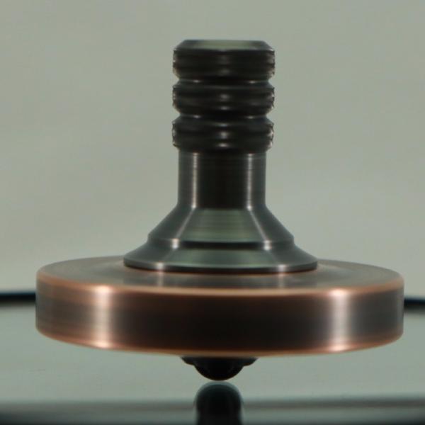 Antique Copper and gunmetal stainless steel metal spinning top - Kemner Design