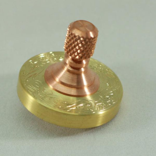 Brass and Copper engraved spinning top by Kemner Design
