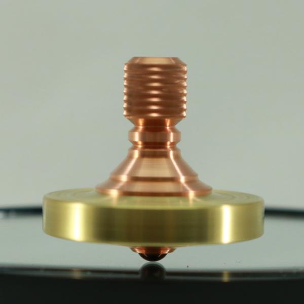 Kemner Design engraved brass and copper two step spinning top