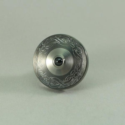 Two Step - Engraved Gunmetal and Brushed Stainless Step Spinning Top - Kemner Design