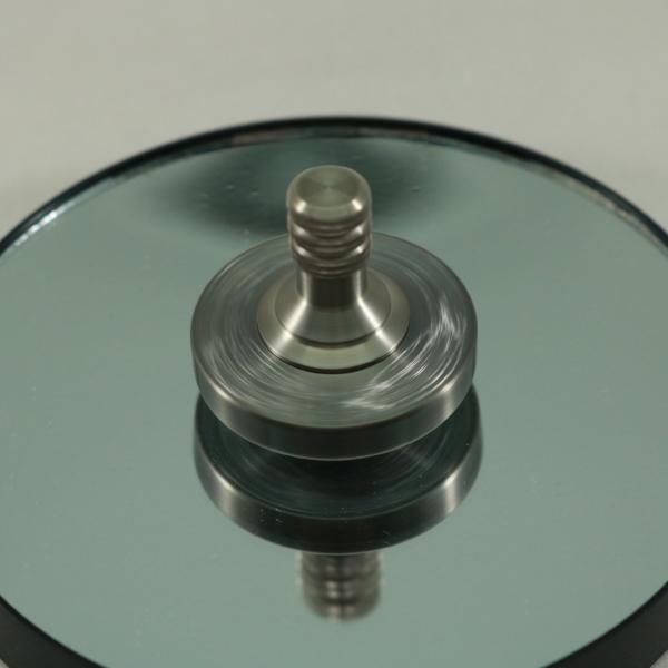 Engraved Spinning Top in Gunmetal Stainless Steel and Brushed Titanium By Kemner Design