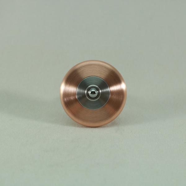 The spin surface of this copper and stainless steel M3 is a 3/16" tungsten carbide bearing