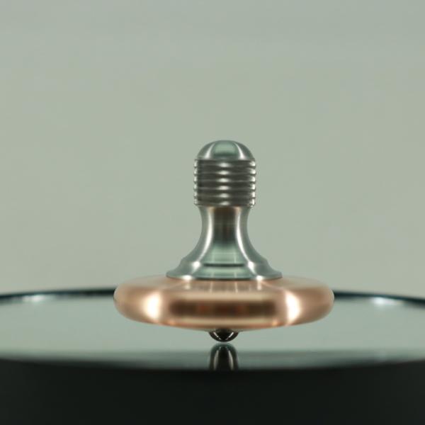 Spinning view of the Kemner Design M3 in copper and stainless steel with a TC Bearing