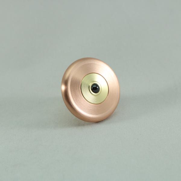 The M3 by Kemner Design shown here with a copper ring and brass stem featuring a ceramic bearing for it's contact point.