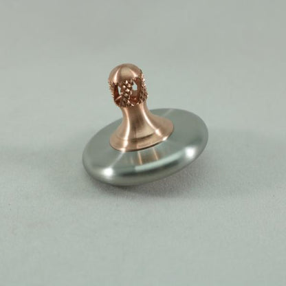 M3 - Brushed Stainless Steel and Copper Spinning Top Super Grip - Kemner Design