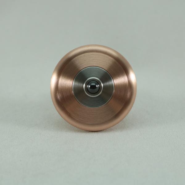 View of the underside of the M3 in brushed copper and stainless steel, showcasing the ceramic bearing