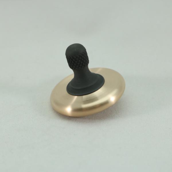 Beautifully contrasted M3 spinning top with a bronze outer ring over a knurled blacked out stainless steel stem
