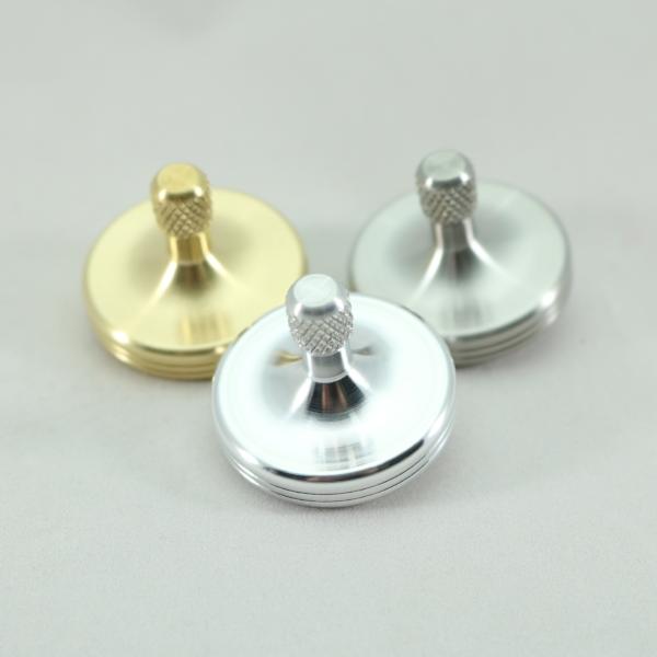 The basic metals collection from Kemner Design showcases the S2 spinning top in aluminum, brass and stainless steel
