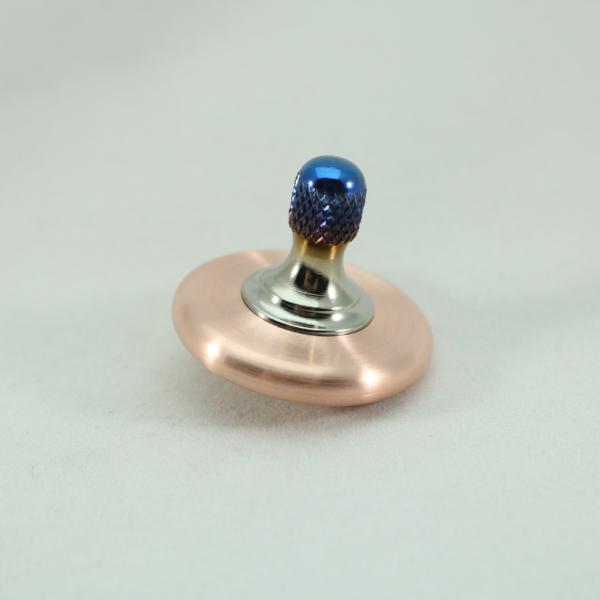 Brushed Copper and flamed titanium M3 metal spinning top by Kemner Design