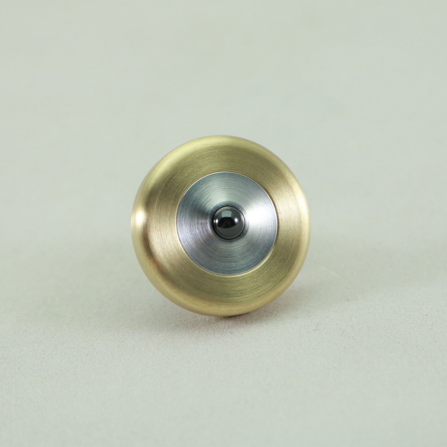 Bearing view of the Dynamini by Kemner Design in Brass and Aluminum 