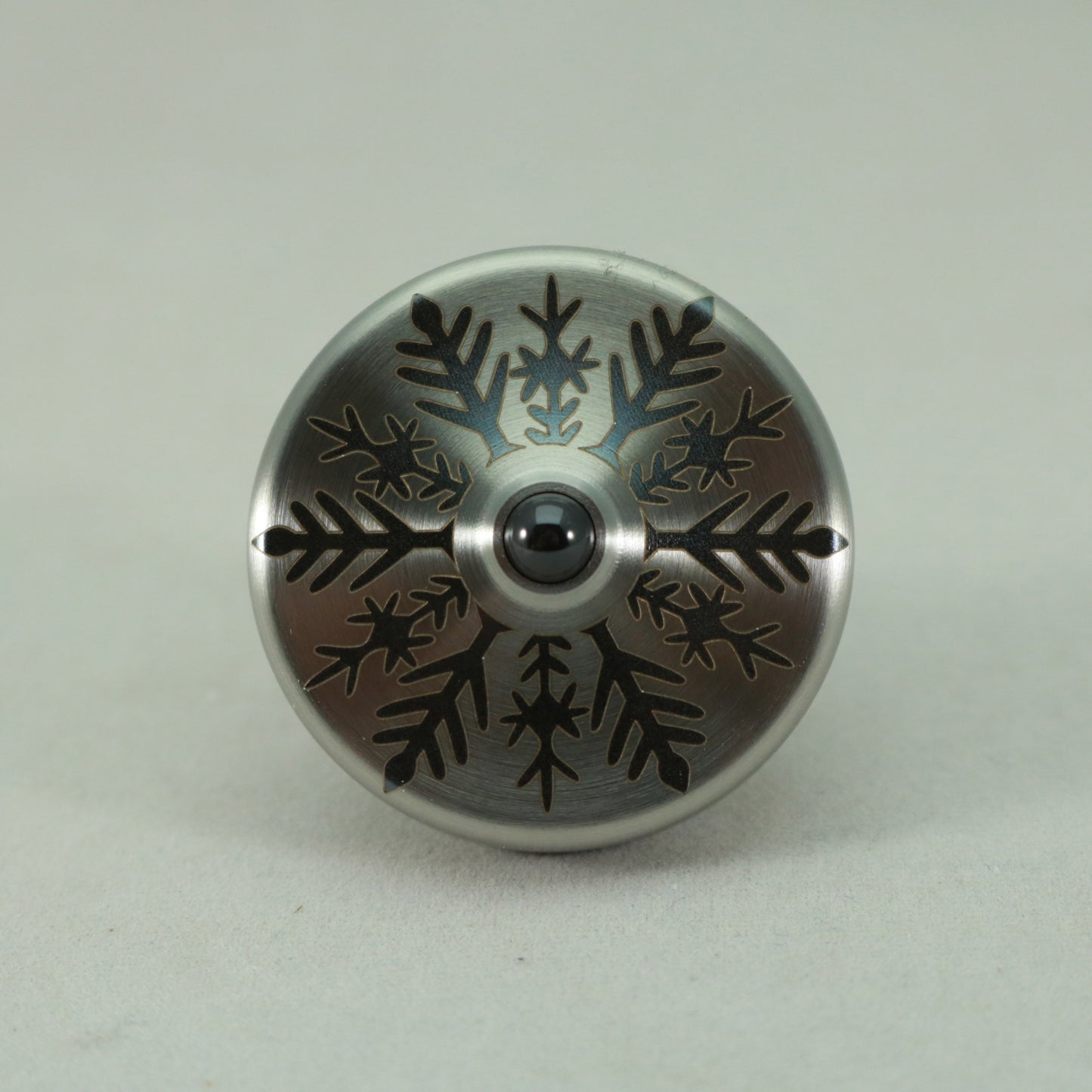 S2- Laser Etched Snowflake on a Stainless Steel Spinning Top