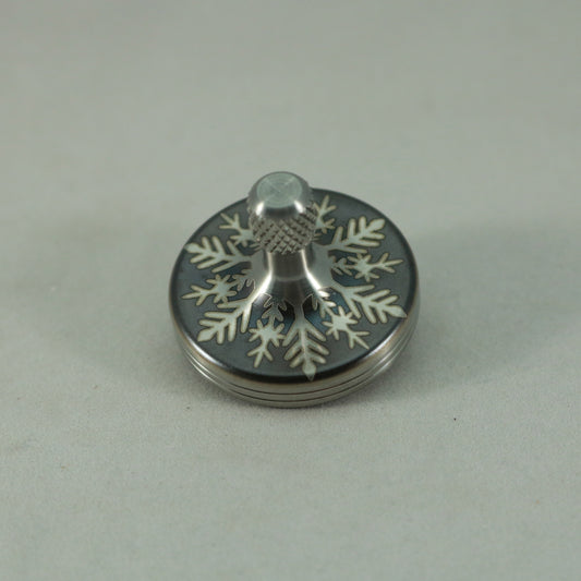 S2- Laser Etched  Inverted Snowflake on a Stainless Steel Spinning Top