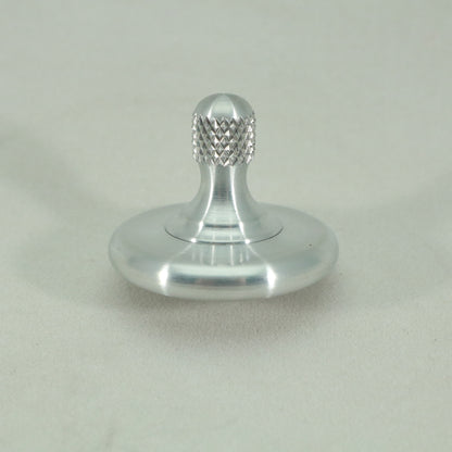 Simple and elegant the M3 spinning top by Kemner Design in brushed aluminum
