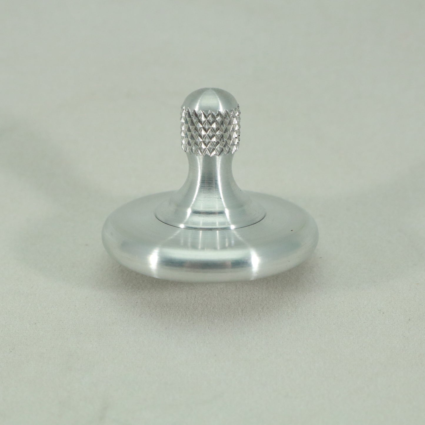 Simple and elegant the M3 spinning top by Kemner Design in brushed aluminum