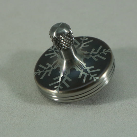 S2- Laser Etched  Inverted Snowflake on a Stainless Steel Spinning Top V2