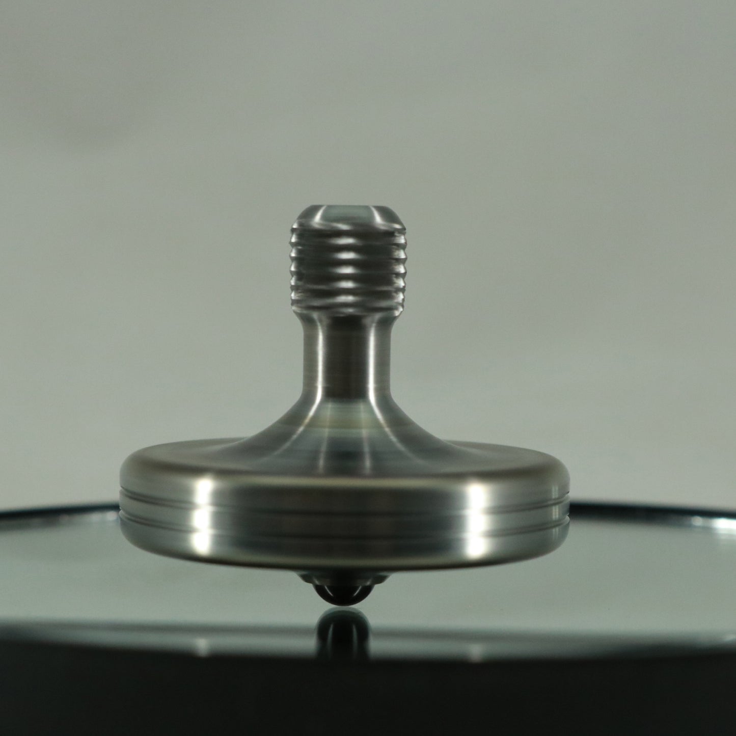 S2- Laser Etched  Inverted Snowflake on a Stainless Steel Spinning Top V2