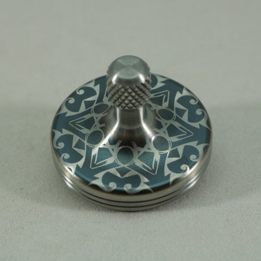 S2- Laser Etched  Inverted Snowflake on a Stainless Steel Spinning Top Version 3
