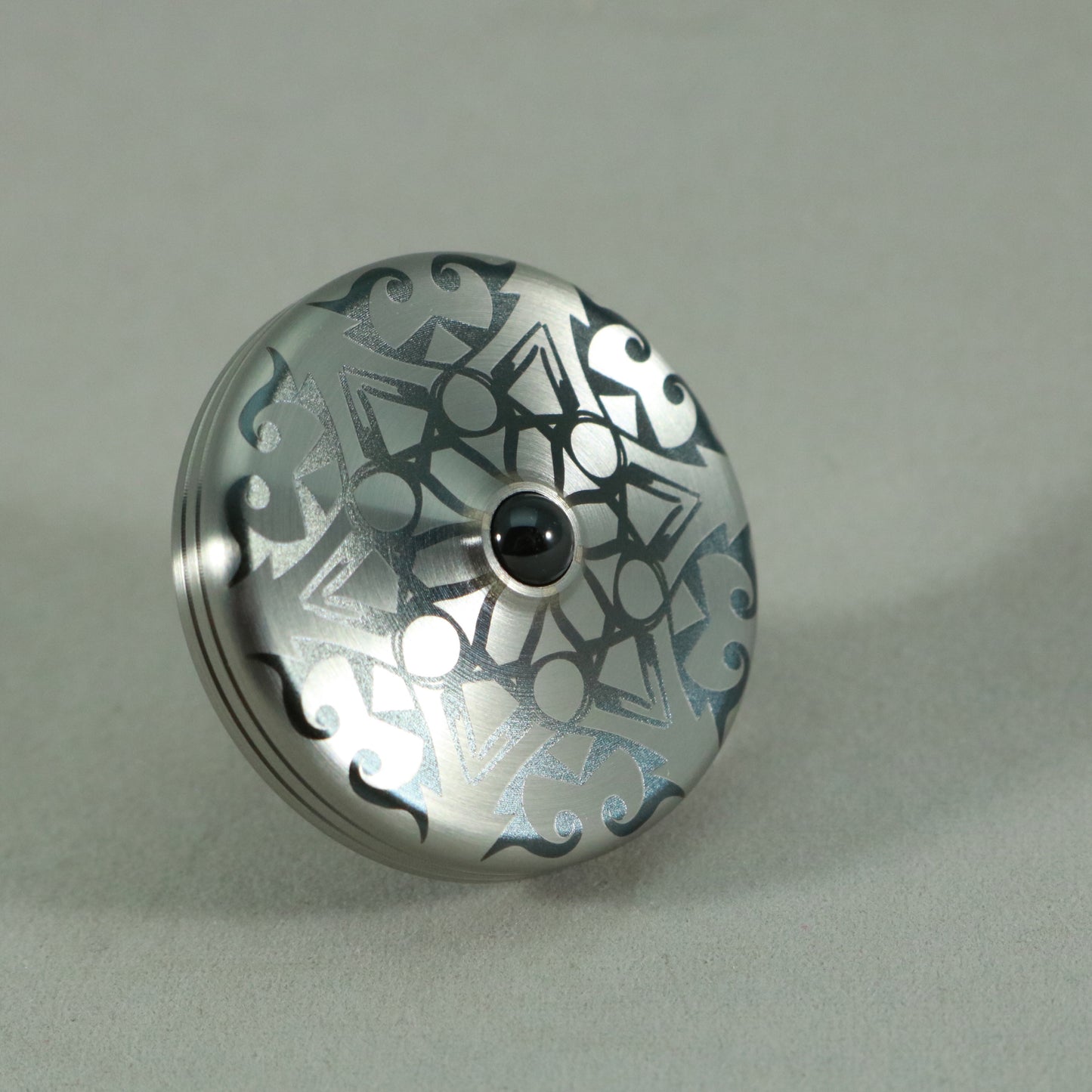 S2- Laser Etched Snowflake on a Stainless Steel Spinning Top v3